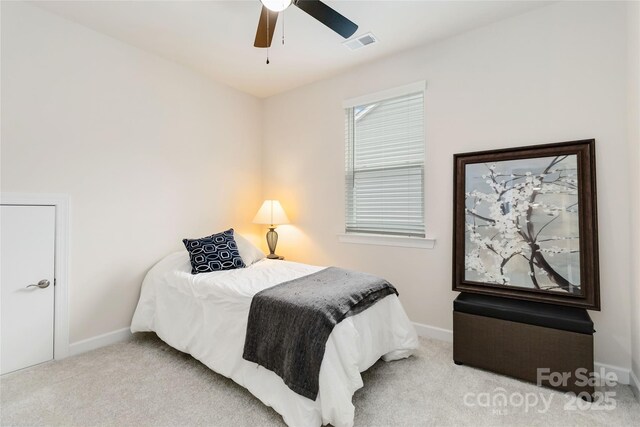 bedroom with baseboards, visible vents, and carpet flooring