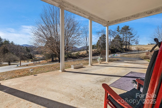 view of patio with a mountain view