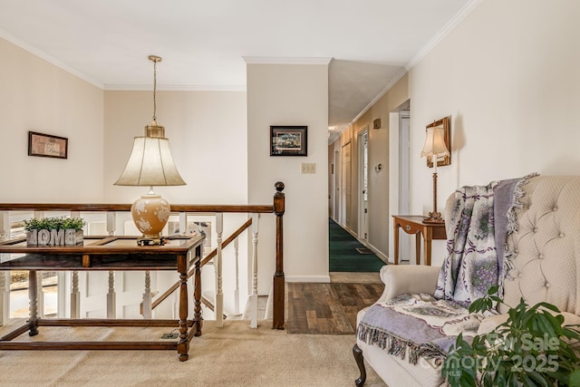 corridor featuring baseboards, wood finished floors, crown molding, and an upstairs landing