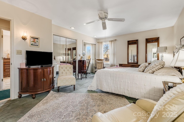 carpeted bedroom with ceiling fan and recessed lighting