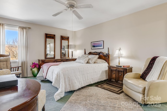 bedroom with carpet floors and a ceiling fan