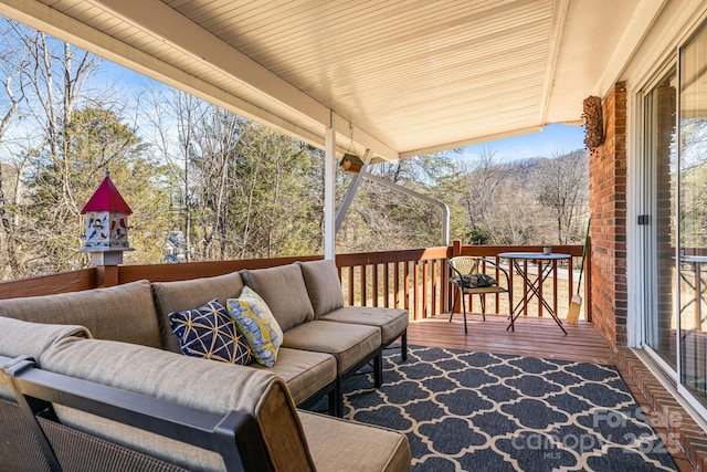 deck featuring an outdoor living space