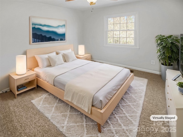 bedroom with carpet flooring and baseboards