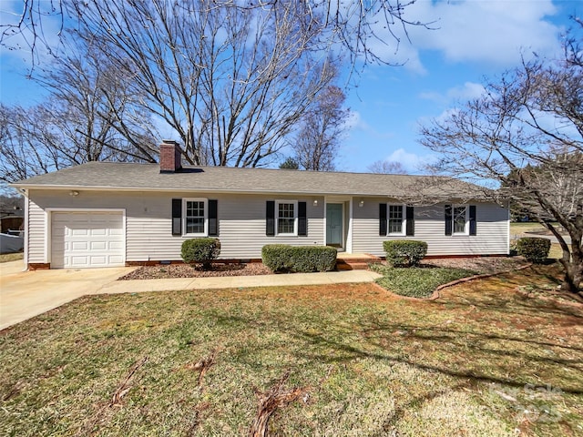 ranch-style home with an attached garage, driveway, a chimney, and a front lawn