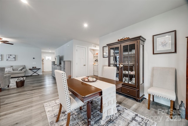 dining space with ceiling fan, light wood finished floors, visible vents, and recessed lighting