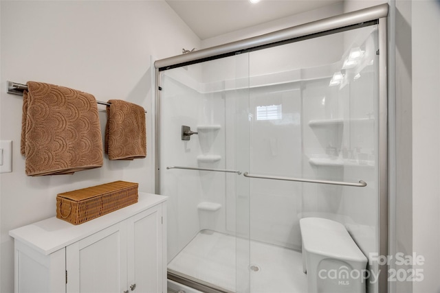 bathroom featuring a stall shower