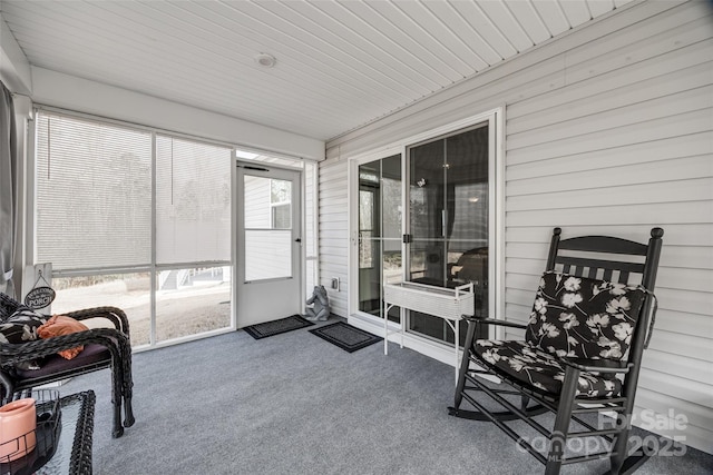 sunroom with wood ceiling