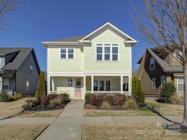 view of front of property featuring covered porch