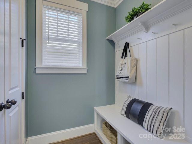 mudroom with baseboards and wood finished floors