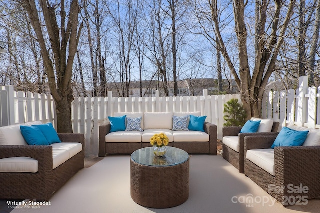 view of patio / terrace with a fenced backyard and outdoor lounge area