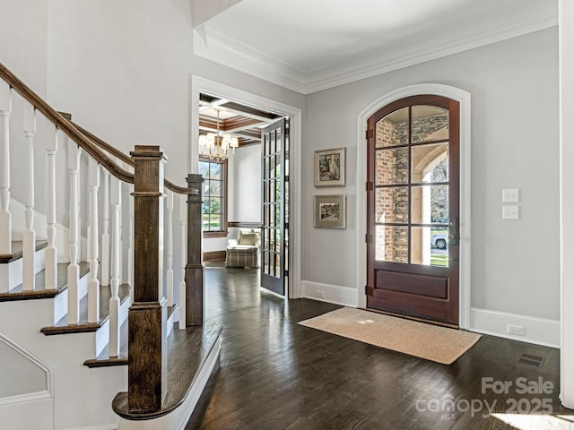 entryway featuring dark wood-style floors, baseboards, ornamental molding, and coffered ceiling