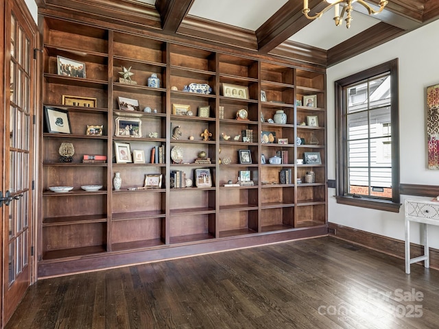 interior space with coffered ceiling, crown molding, dark wood finished floors, and beamed ceiling