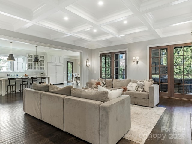 living room featuring recessed lighting, beam ceiling, coffered ceiling, and dark wood finished floors