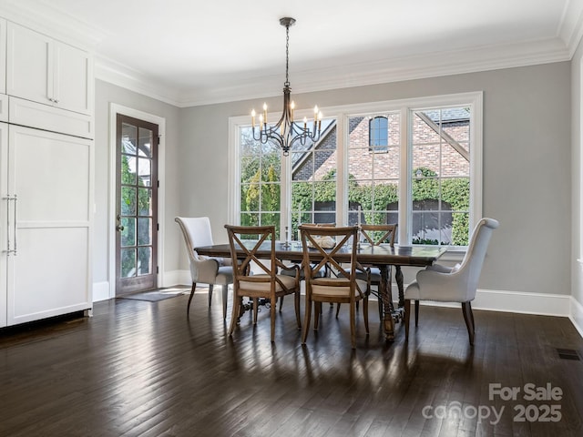 dining space featuring dark wood-style flooring, plenty of natural light, visible vents, and crown molding