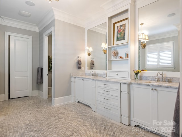 full bath featuring baseboards, ornamental molding, and vanity