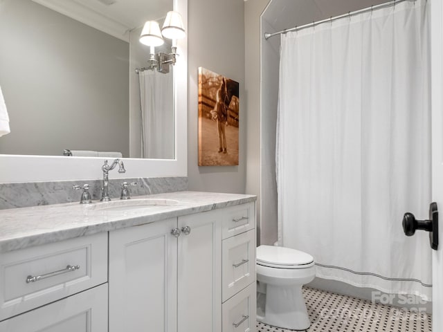 full bathroom featuring ornamental molding, a shower with curtain, vanity, and toilet