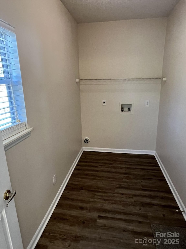 washroom featuring laundry area, baseboards, dark wood-style floors, hookup for a washing machine, and electric dryer hookup