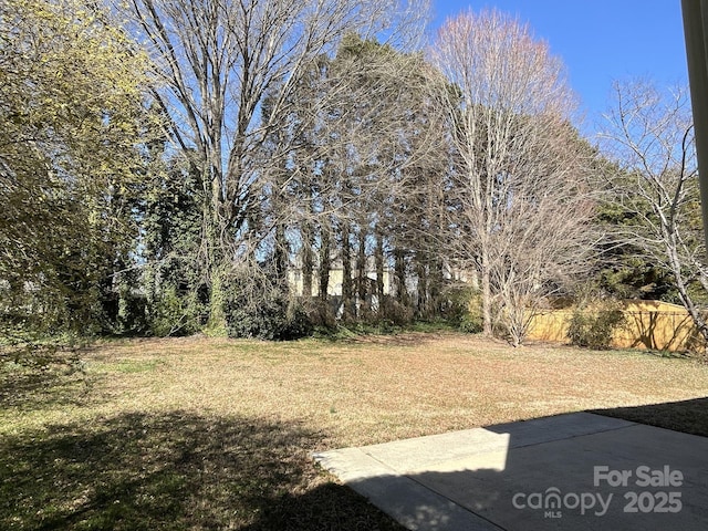 view of yard with fence