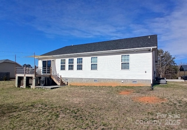 back of property with crawl space, a yard, stairs, and a wooden deck