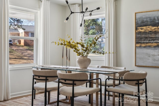 dining room with baseboards