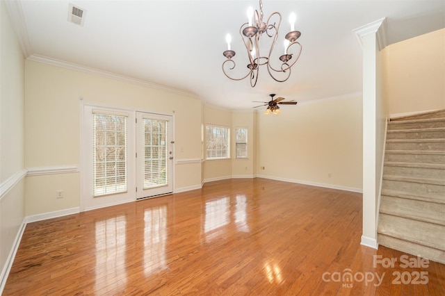 interior space with visible vents, light wood-style flooring, stairway, ornamental molding, and baseboards