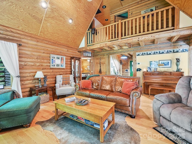 living area featuring high vaulted ceiling, wood-type flooring, and wood ceiling