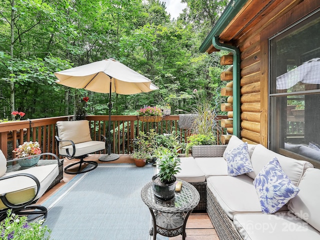 wooden deck with an outdoor hangout area