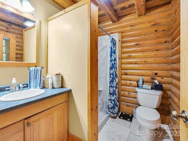 bathroom featuring a stall shower, rustic walls, and toilet