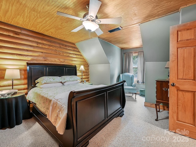 carpeted bedroom featuring rustic walls, visible vents, a ceiling fan, lofted ceiling, and wooden ceiling