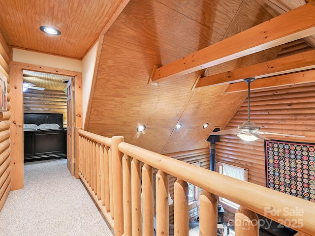 hallway with wooden ceiling, carpet flooring, and recessed lighting