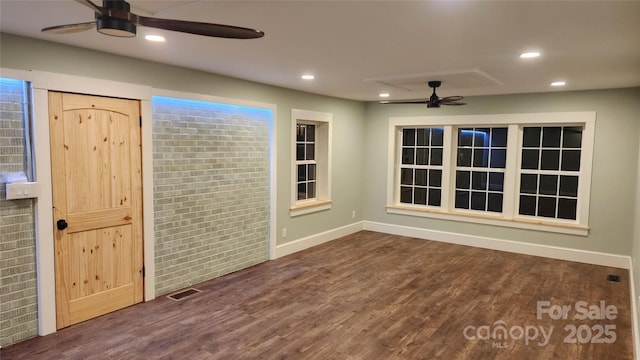 621 Watts St NE, Valdese, NC 28690 - unfurnished room with baseboards, recessed lighting, wood finished floors, and ceiling fan