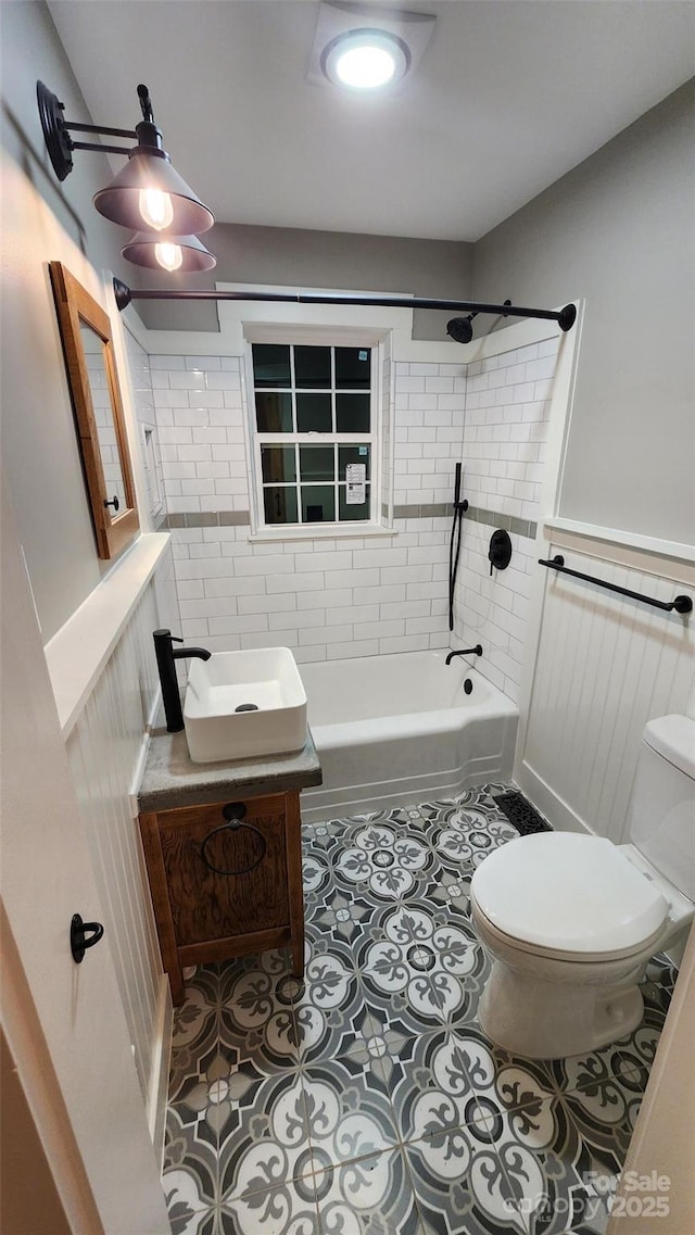 621 Watts St NE, Valdese, NC 28690 - full bathroom featuring tile patterned floors, vanity, toilet, and shower / tub combination