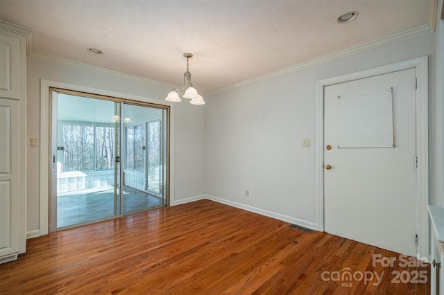 8080 Monbo Rd, Catawba, NC 28609 - empty room with wood finished floors, visible vents, and crown molding