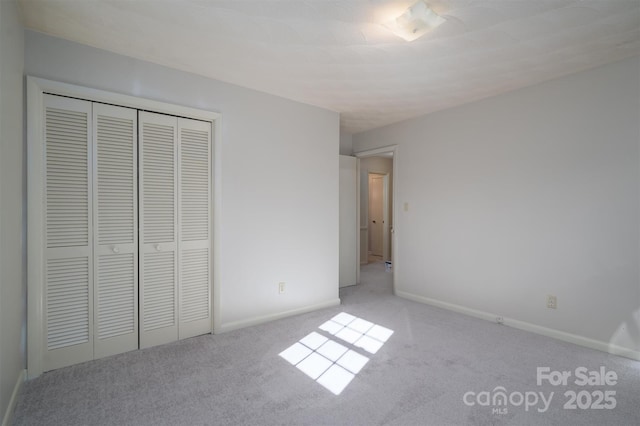 8080 Monbo Rd, Catawba, NC 28609 - unfurnished bedroom with carpet floors, a closet, and baseboards