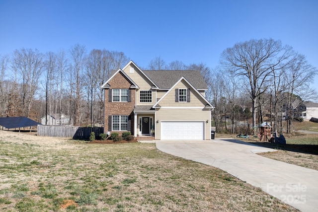 view of front facade with a garage, concrete driveway, a front lawn, and fence