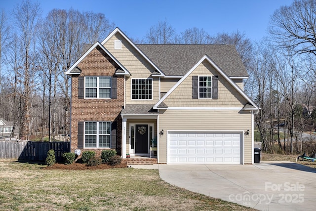 view of front of house featuring a garage, fence, driveway, roof with shingles, and a front yard