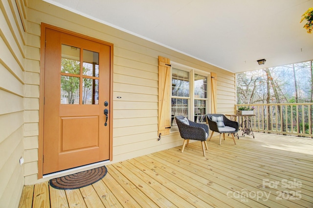 wooden deck with a porch