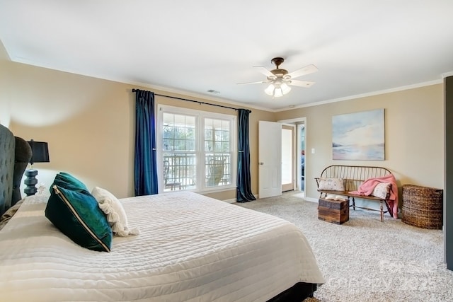 carpeted bedroom with a ceiling fan, visible vents, crown molding, and baseboards