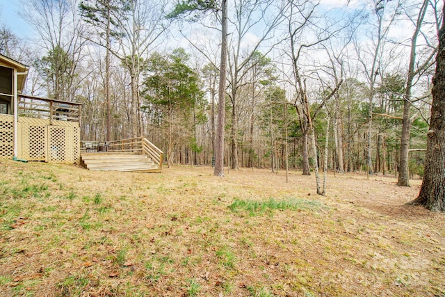 view of yard featuring a deck