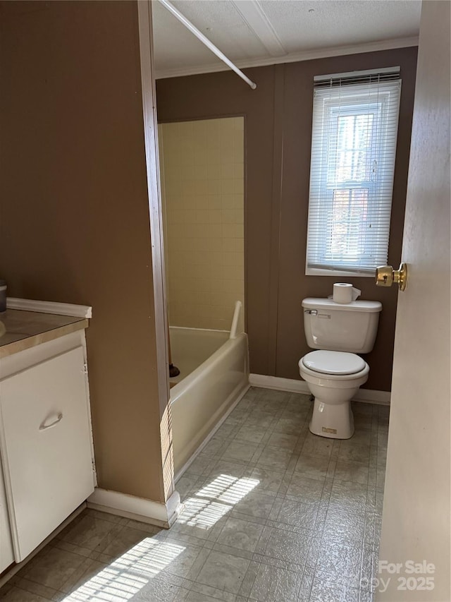 bathroom featuring shower / bath combination, baseboards, toilet, tile patterned floors, and vanity