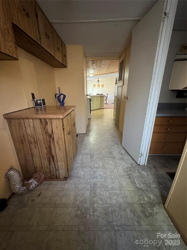 corridor featuring tile patterned floors