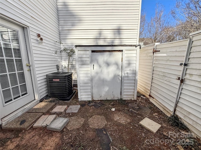 view of patio / terrace with fence and central AC