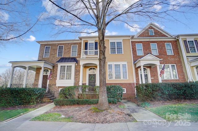 multi unit property featuring brick siding