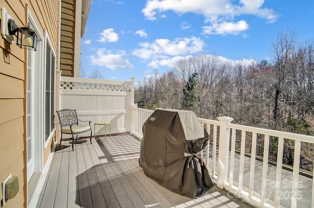 wooden terrace with grilling area