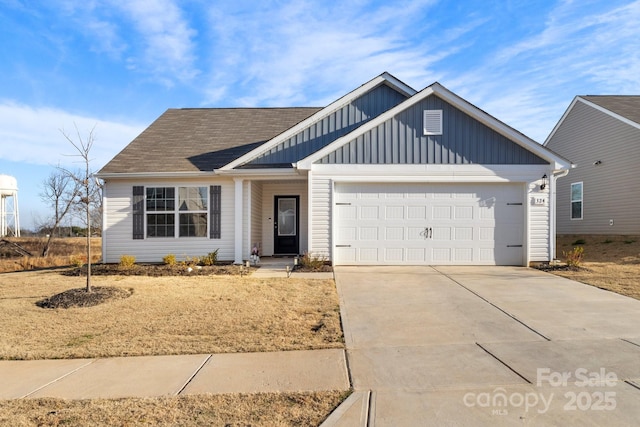 view of front facade featuring a garage, board and batten siding, concrete driveway, and roof with shingles