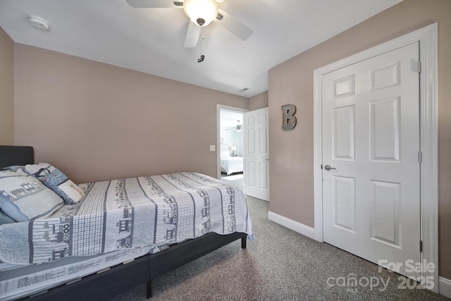 bedroom featuring carpet, baseboards, and a ceiling fan