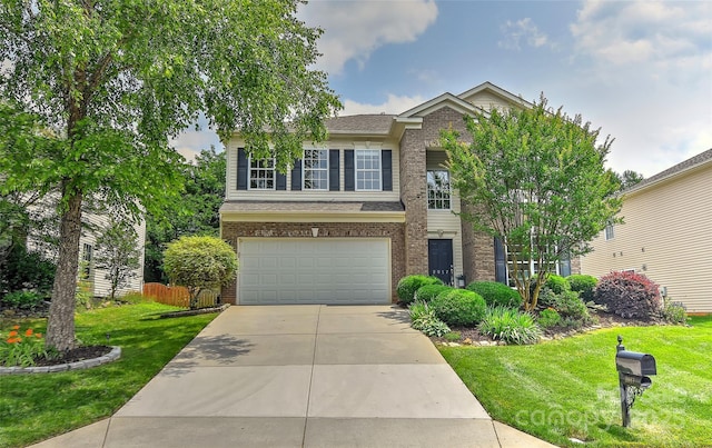 2017 Bridleside Dr, Indian Trail, NC 28079 - traditional home with brick siding, an attached garage, driveway, and a shingled roof
