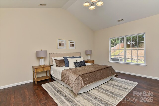 2017 Bridleside Dr, Indian Trail, NC 28079 - bedroom featuring lofted ceiling, baseboards, and wood finished floors