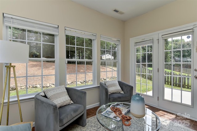 2017 Bridleside Dr, Indian Trail, NC 28079 - sunroom with french doors, healthy amount of natural light, and baseboards