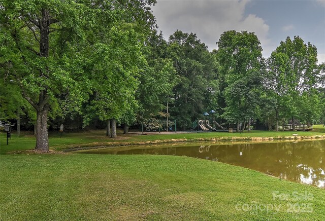 2017 Bridleside Dr, Indian Trail, NC 28079 - view of home's community with a yard and a water view